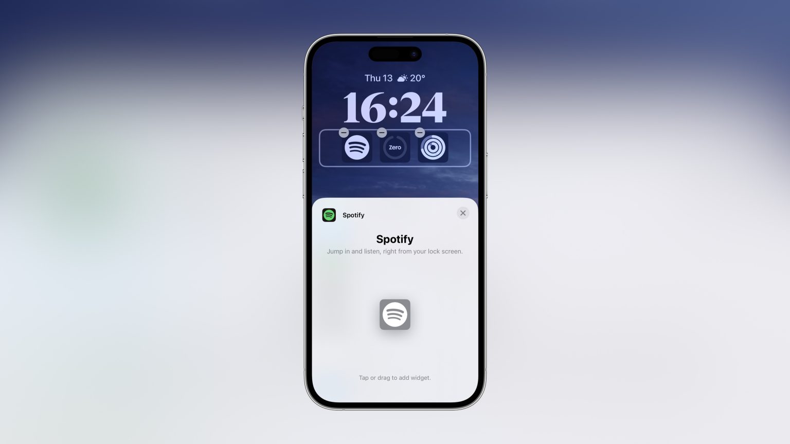 An iPhone displaying a lock screen with a Spotify widget. The lock screen shows the time 16:24, date “Thu 13,” and weather “20°C.” Below the time are three circular widgets, including the Spotify icon. The lower part of the screen shows a prompt to add the Spotify widget with the text: “Spotify - Jump in and listen, right from your lock screen.” The background is a gradient of blue to white.