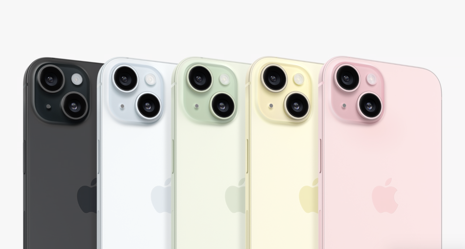 iPhone 15 showing backs with all five new colors - black, blue, green, yellow, and pink