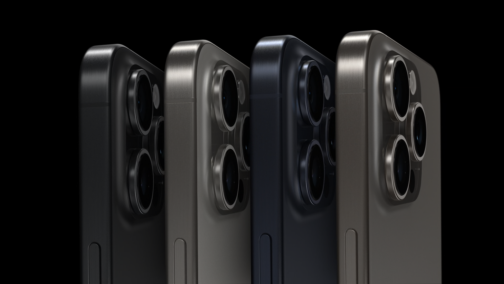 iPhone 15 Pro in all four new titanium finishes - black, white, blue, and natural titanium. Apple